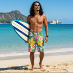 Colorful Tropical Print floral shorts by Bongo Beachwear, worn by South Pacific Islander on Waikiki Beach