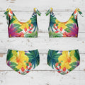 Font and back tropical print kid's bikini set on a rustic nautical wood background