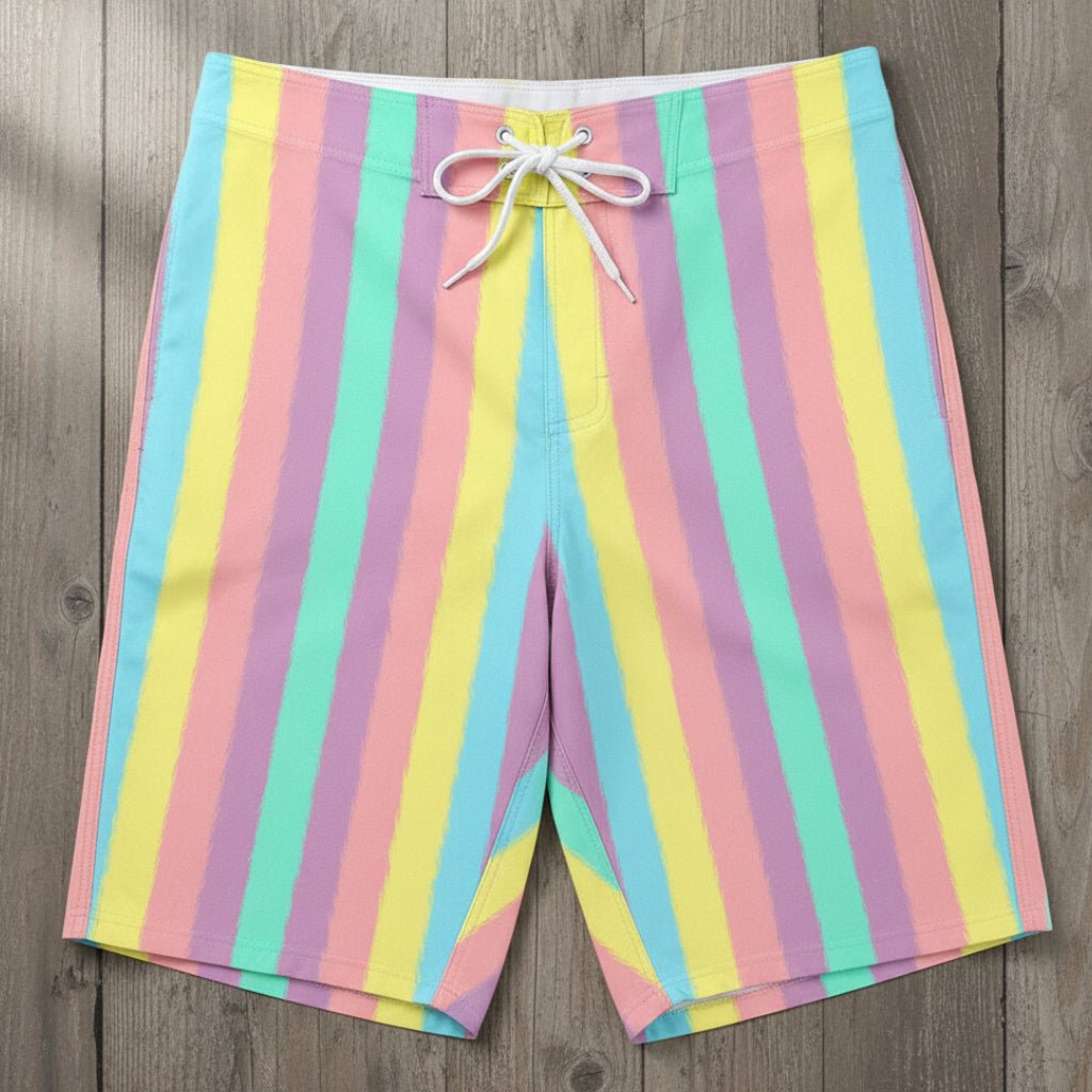 Tropical Pastel striped board shorts on a rustic wood background