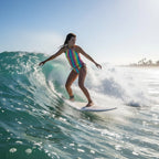 Girl wearing Multicolored striped Tankini surfing in Hawaii 