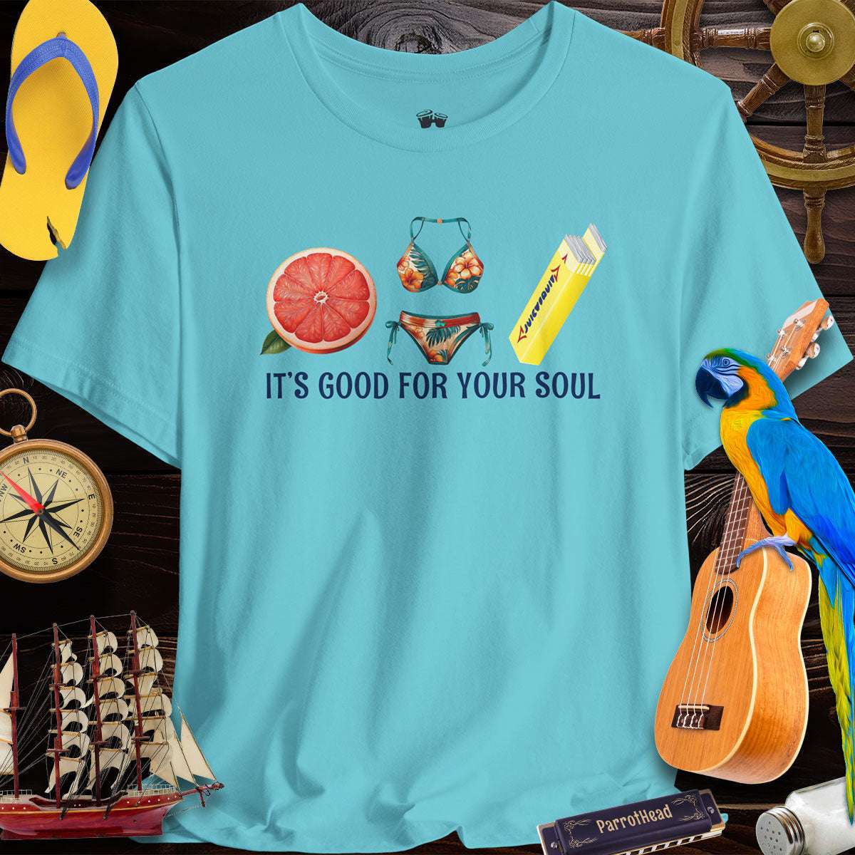 Grapefruit Juicy Fruit ParrotHead T-Shirt, featuring beach vibes and the phrase 'It's Good for Your Soul' on a tropical blue background.