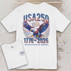 White t-shirt with eagle graphic and 'USA 250' text on a wooden surface