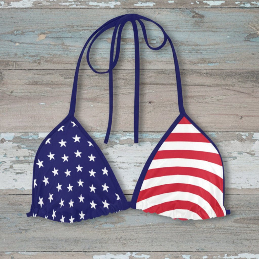 Bikini top with American flag design on a rustic wood background