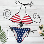 American flag bikini set with floral decorations on a white background