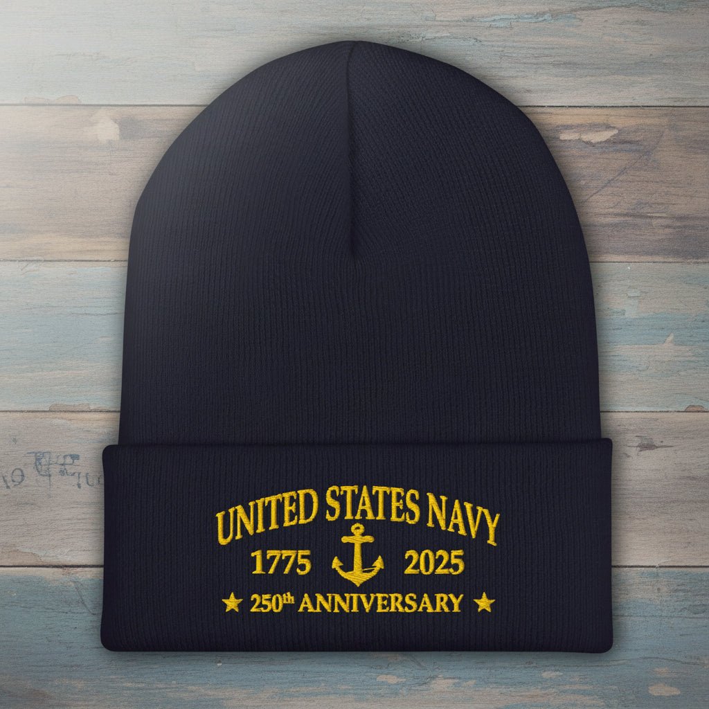 Black beanie with USN 1775-2025 on a rustic wood background