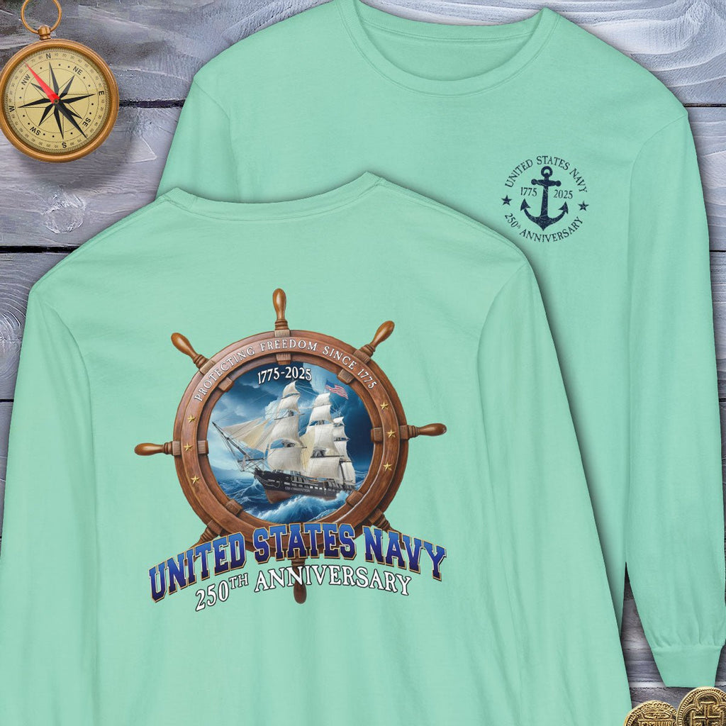 Mint green long-sleeve shirt with United States Navy 250th Anniversary design on a wooden surface.