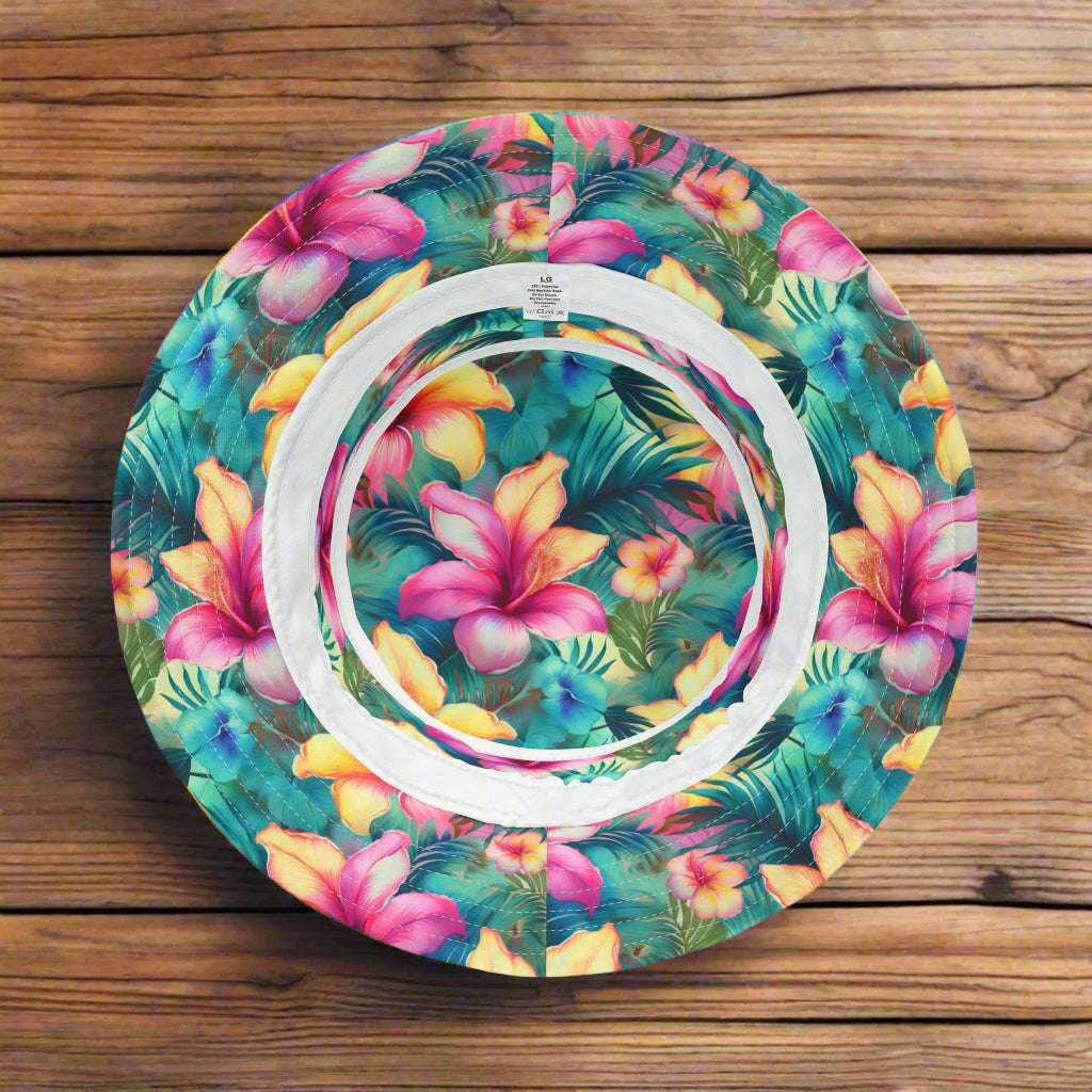 Tropical Floral pattern on the underside of a bucket hat laying on a rustic wood table