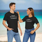 Two people wearing black Pirate's Life unisex tees, showcasing the fun design and comfortable fit for casual outingson a Caribbean Beach