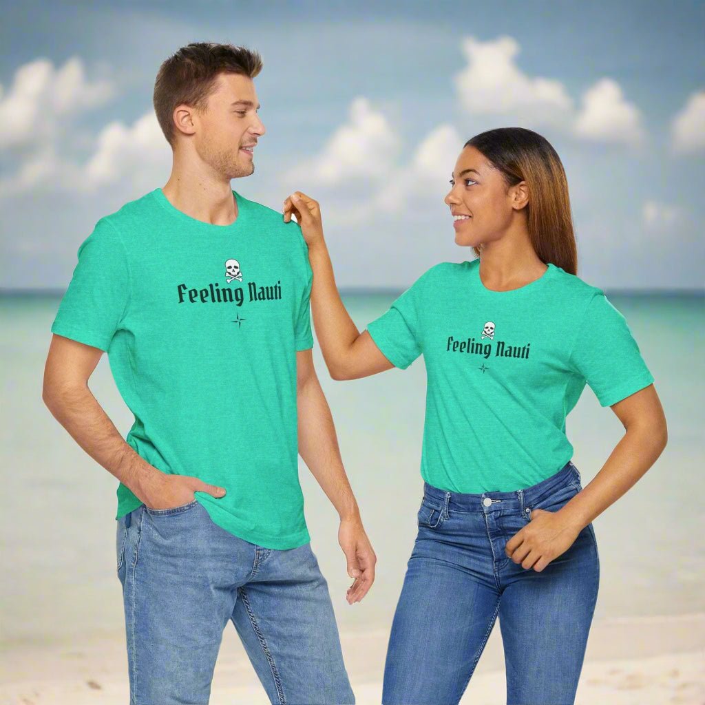 Couple wearing Feeling Nauti' Skull & Crossbone Unisex Pirate Tee in vibrant mint green, showcasing casual style.
