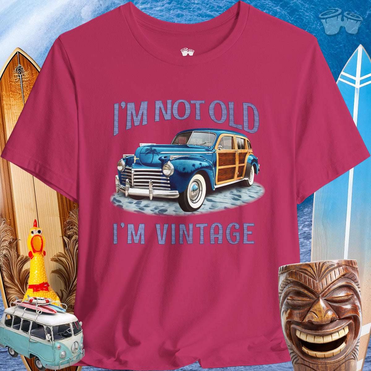 Vintage Cars | Woody Surf Wagon T-Shirt 🤙T-Shirt Over a Surfing Background with surfboards Beach wagons and a Rubber Chicken