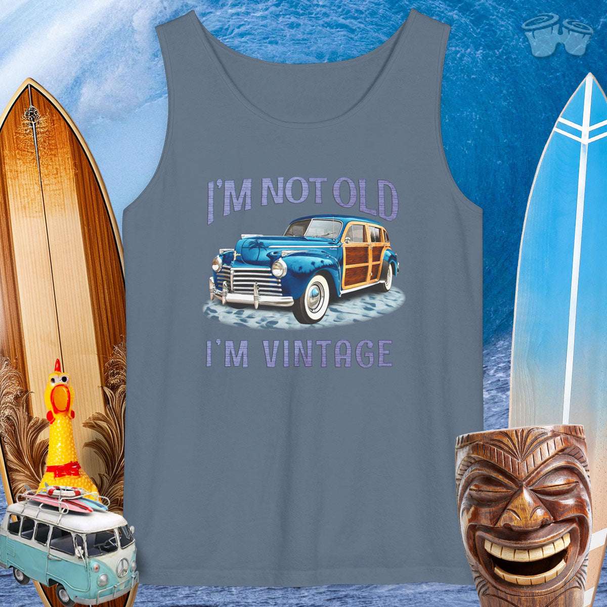 Surf Wagon garment dyed tank top with 'I'm not old, I'm vintage' design, perfect for beach lovers and classic car enthusiasts.