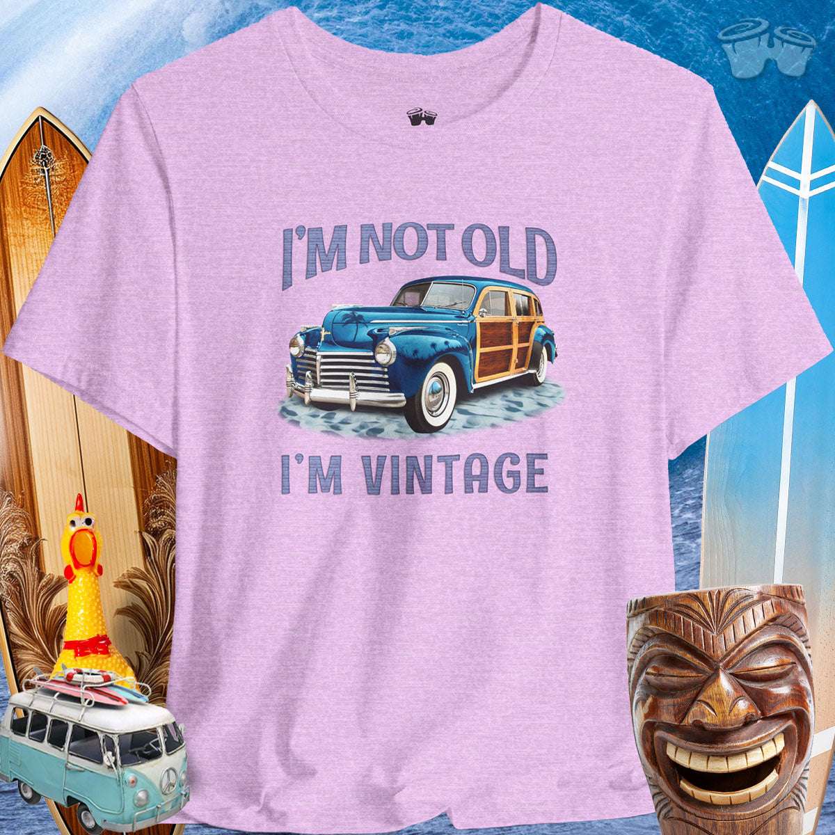 Vintage Cars | Woody Surf Wagon T-Shirt 🤙T-Shirt Over a Surfing Background with surfboards Beach wagons and a Rubber Chicken