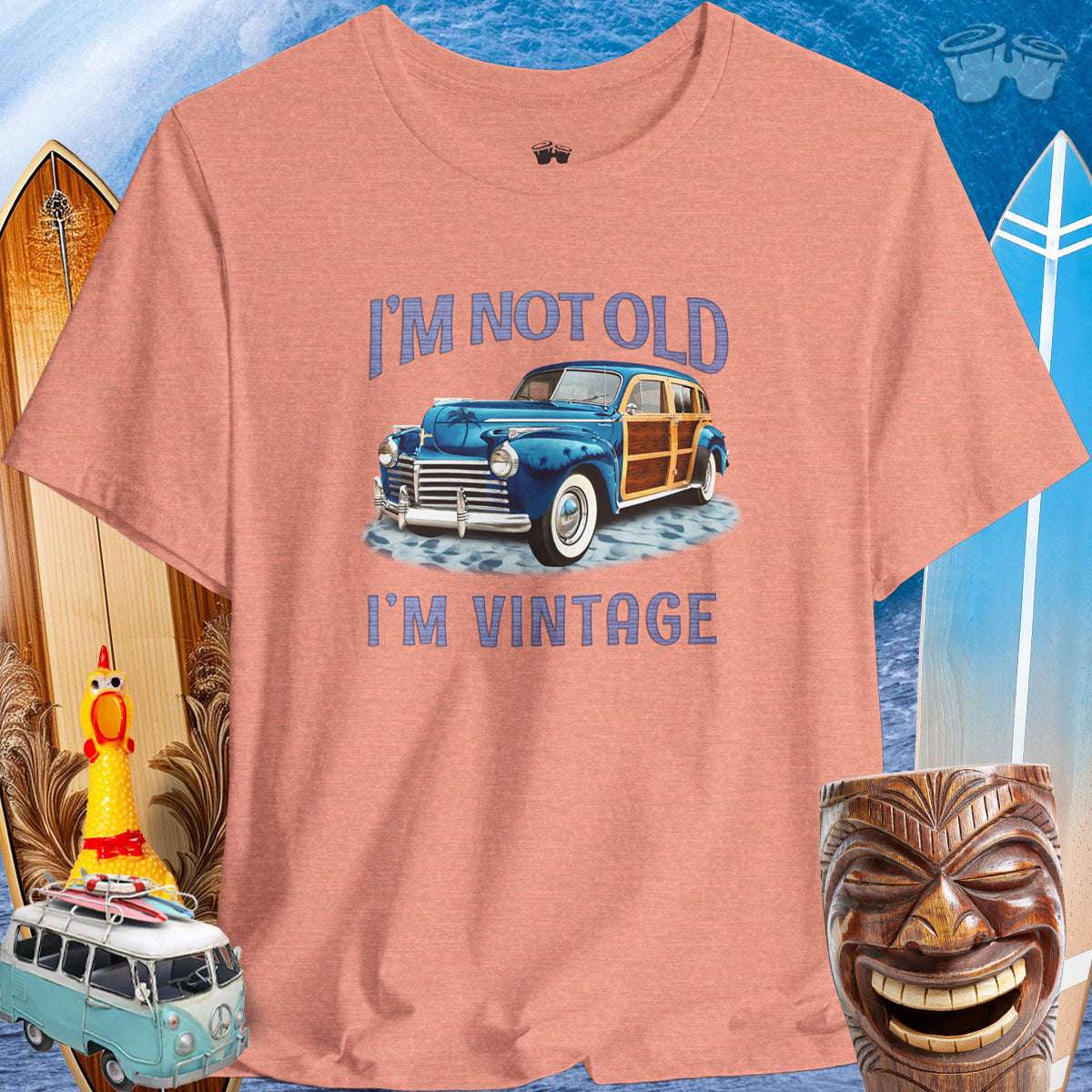 Vintage Cars | Woody Surf Wagon T-Shirt 🤙T-Shirt Over a Surfing Background with surfboards Beach wagons and a Rubber Chicken
