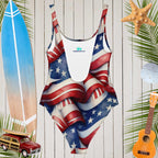 Low cut back on Americana USA Flag pattern swimsuit hanging in front of a rustic wood wall of a seaside surf Shack