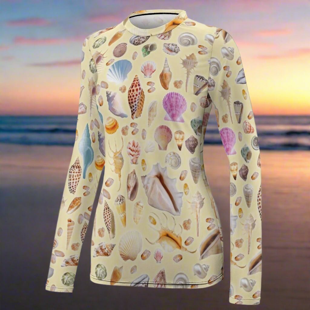 Long-sleeve Sun Protection T-Shirt with colorful shell pattern on a beach background