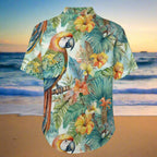 Short-sleeve shirt with tropical parrot and flower pattern on a beach  background