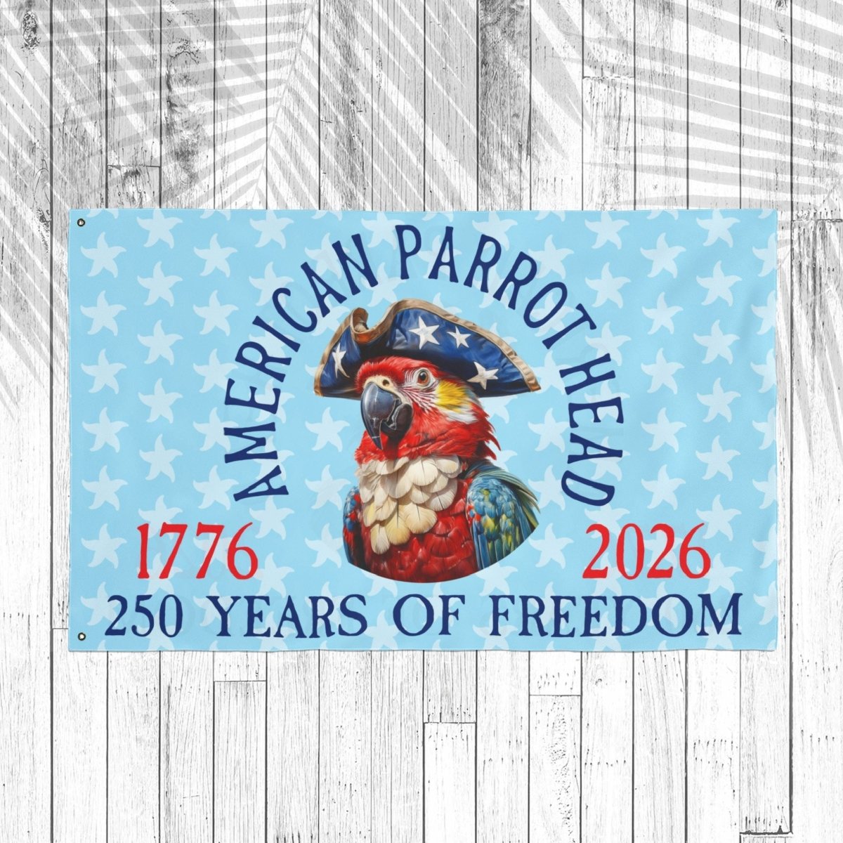 Decorative flag with a parrot in a pirate hat on a blue background with white stars, celebrating 250 years of freedom.