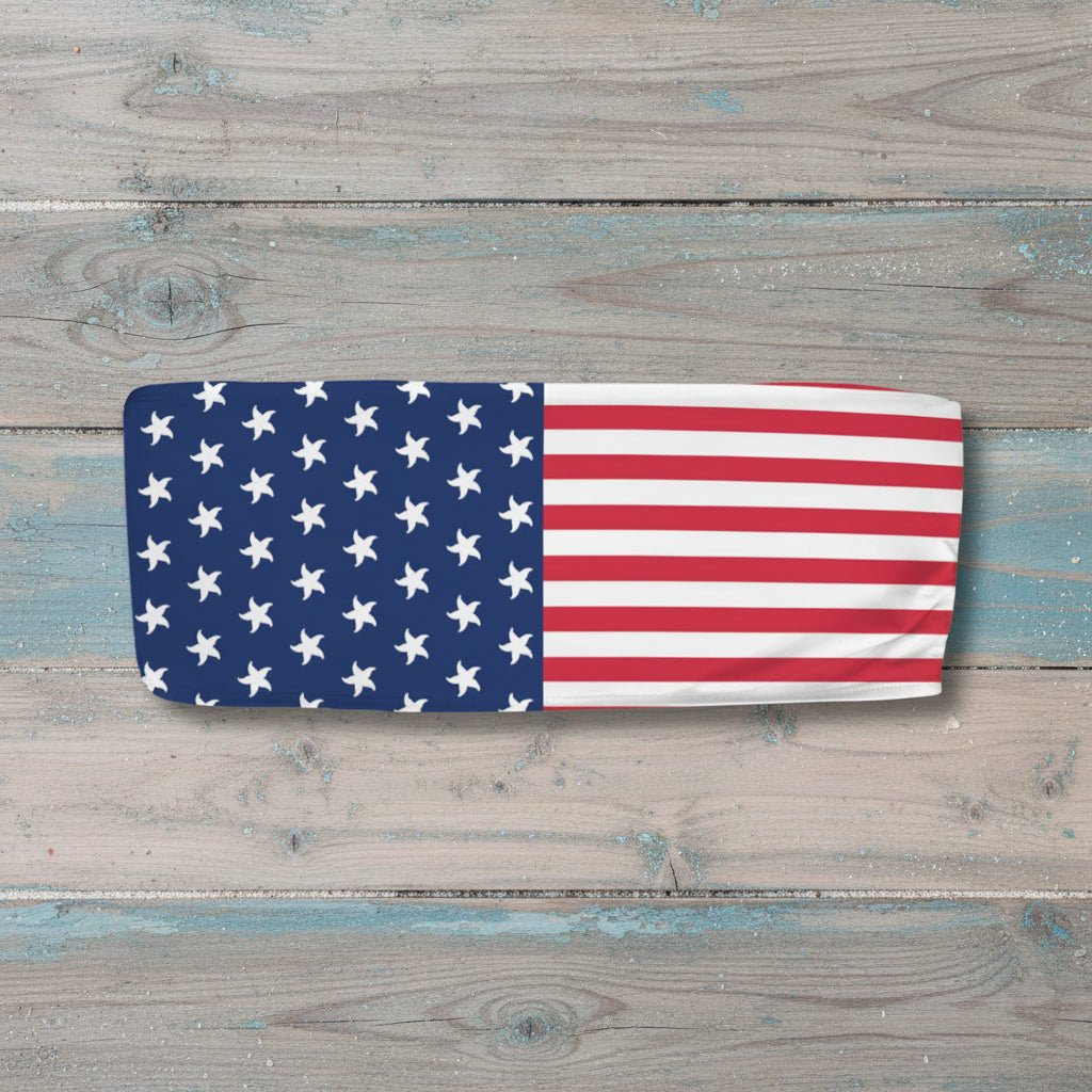 Bandeau top with American flag design on a nautical wood background