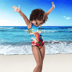 Person wearing a colorful swimsuit with a parrot design on a beach