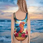 girl wearing a swimsuit with a colorful parrot design against a beach background