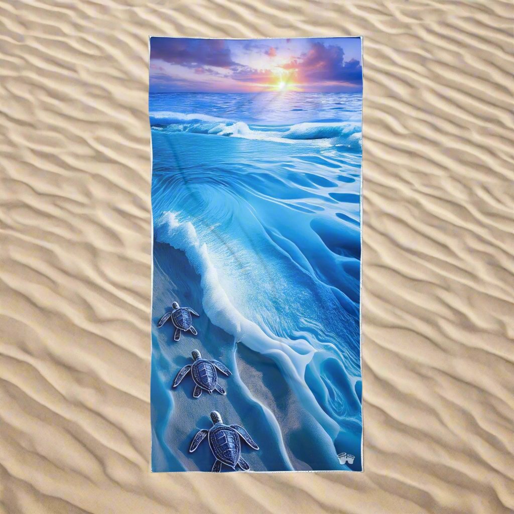 Baby Sea Turtle Beach Towel | Ocean Calling over a fill of beach sand