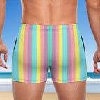 Pastel striped swim shorts with a beach background