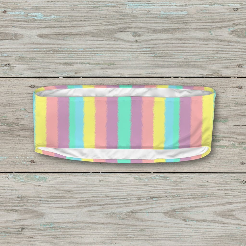 Pastel striped headband on a nautical wood background