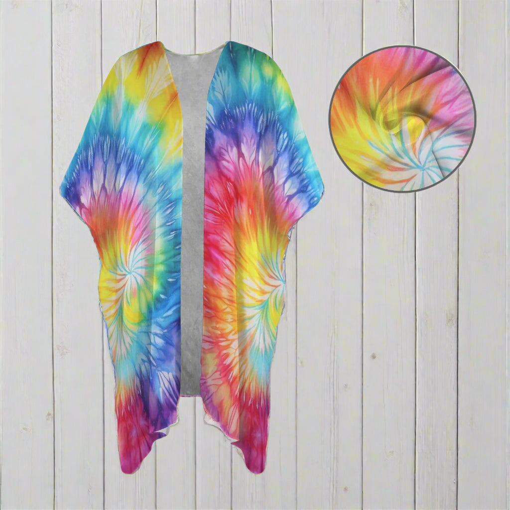 Colorful tie-dye beach cover up with a close-up of the pattern on a nautical wood background
