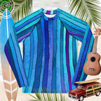 Blue and purple striped sun rashie with surfboard, ukulele, and vintage model car on a tropical background
