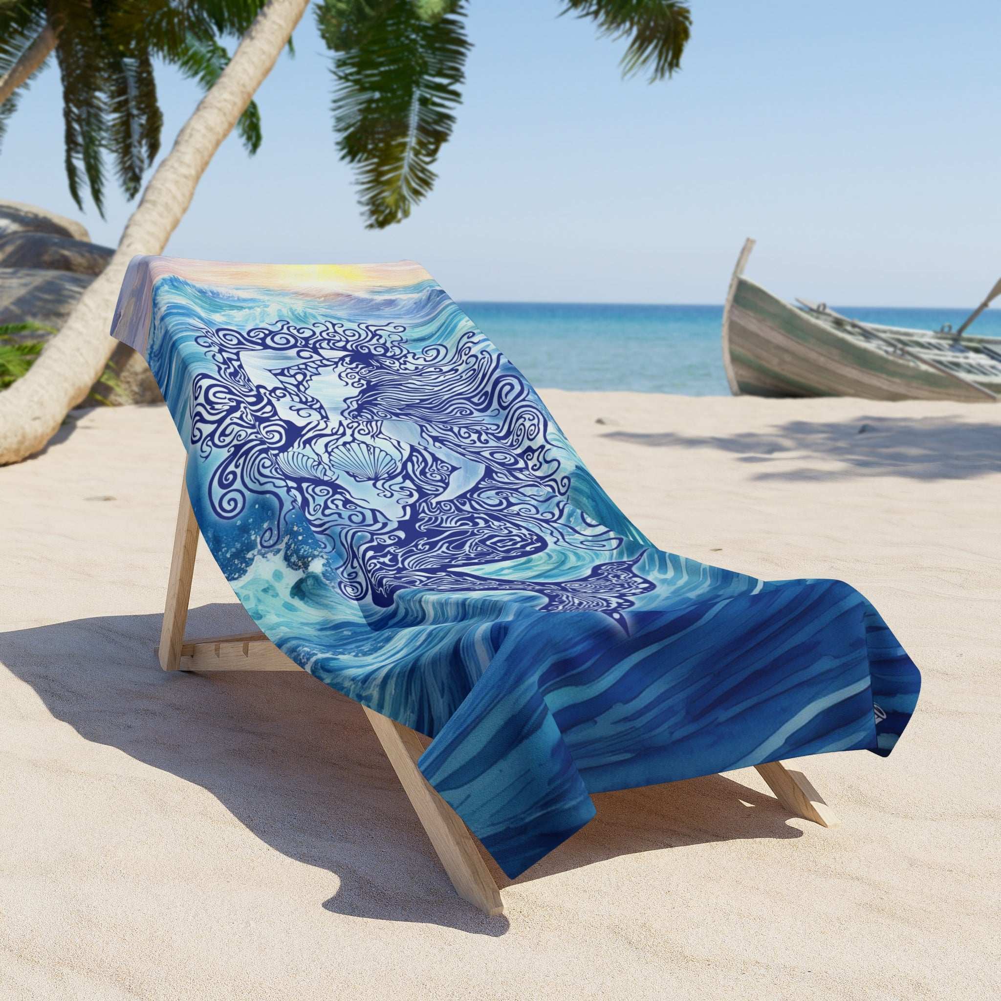 Beach Towel - Mermaid Zen Series by RonBongo laying on a lounge chair on the beach under a palm tree next to an old fishing boat