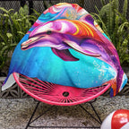 Pink Dolphin towel laid over a pool chair