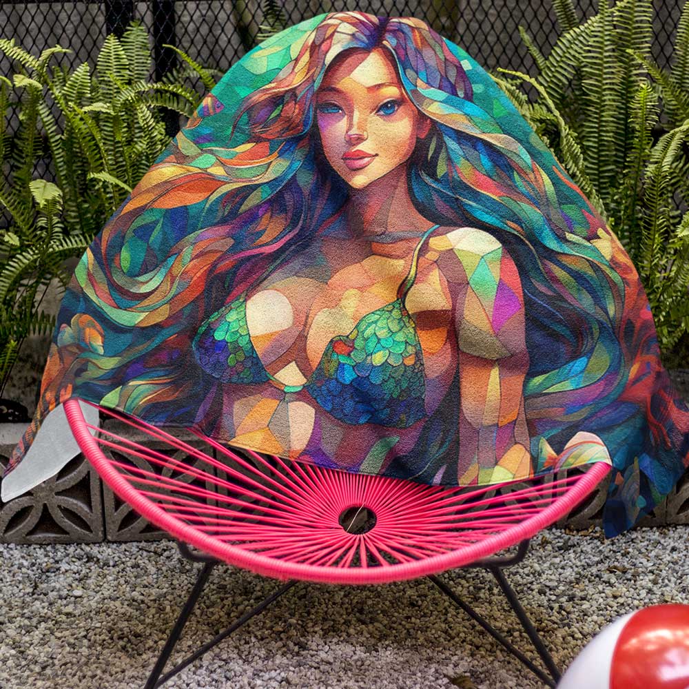 Mermaid beach towel on a pink acapulco chair
