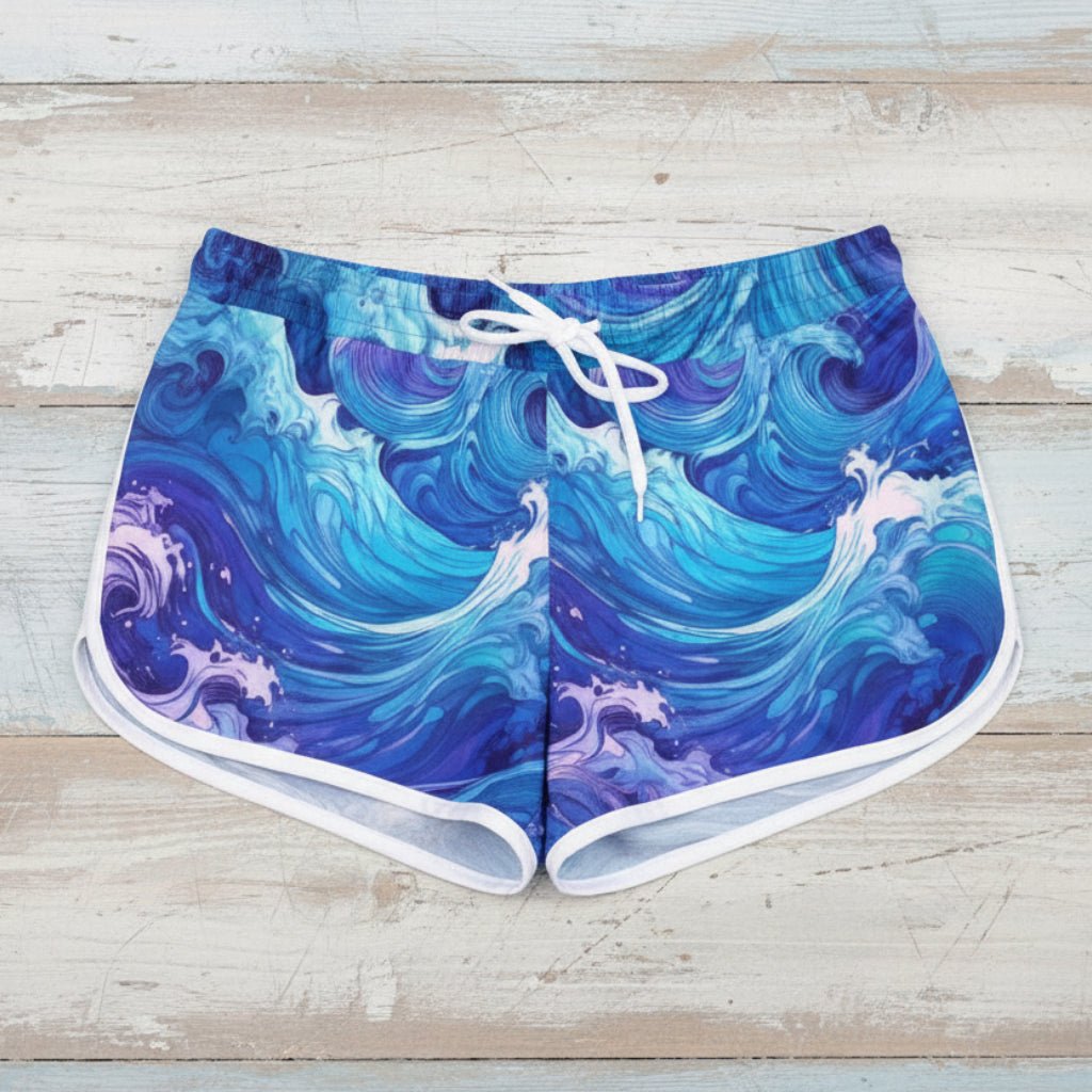 Blue wave-patterned shorts on a rustic wood background
