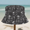 Bucket hat with black and white skull pattern on a beach in St. Somewhere