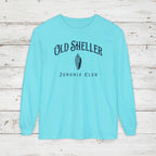 Light blue long-sleeve shirt with 'Old Sheller Junonia Club' text and shell graphic on a white background