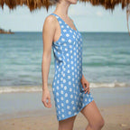 Beach Cover Up Tank Top Dress, blue with white sand-dollars in a polka dot pattern. standing sideways pose in a beachside tiki bar