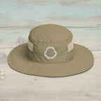 Khaki wide-brimmed hat with shark jaw embroidery on a faded wood background 