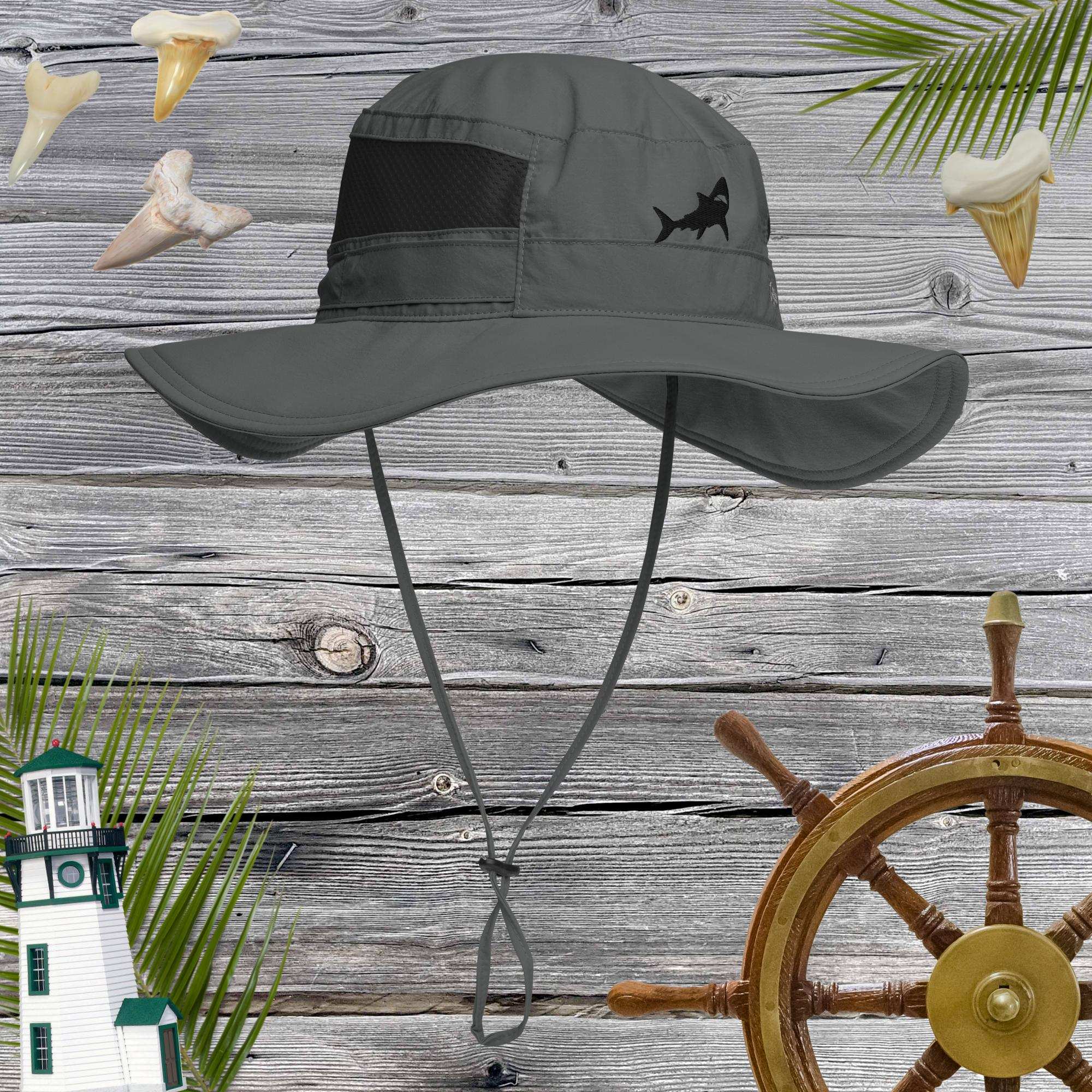 Charcoal Booney Sun Hat by Columbia with embroidered shark on a rustic nautical background. 