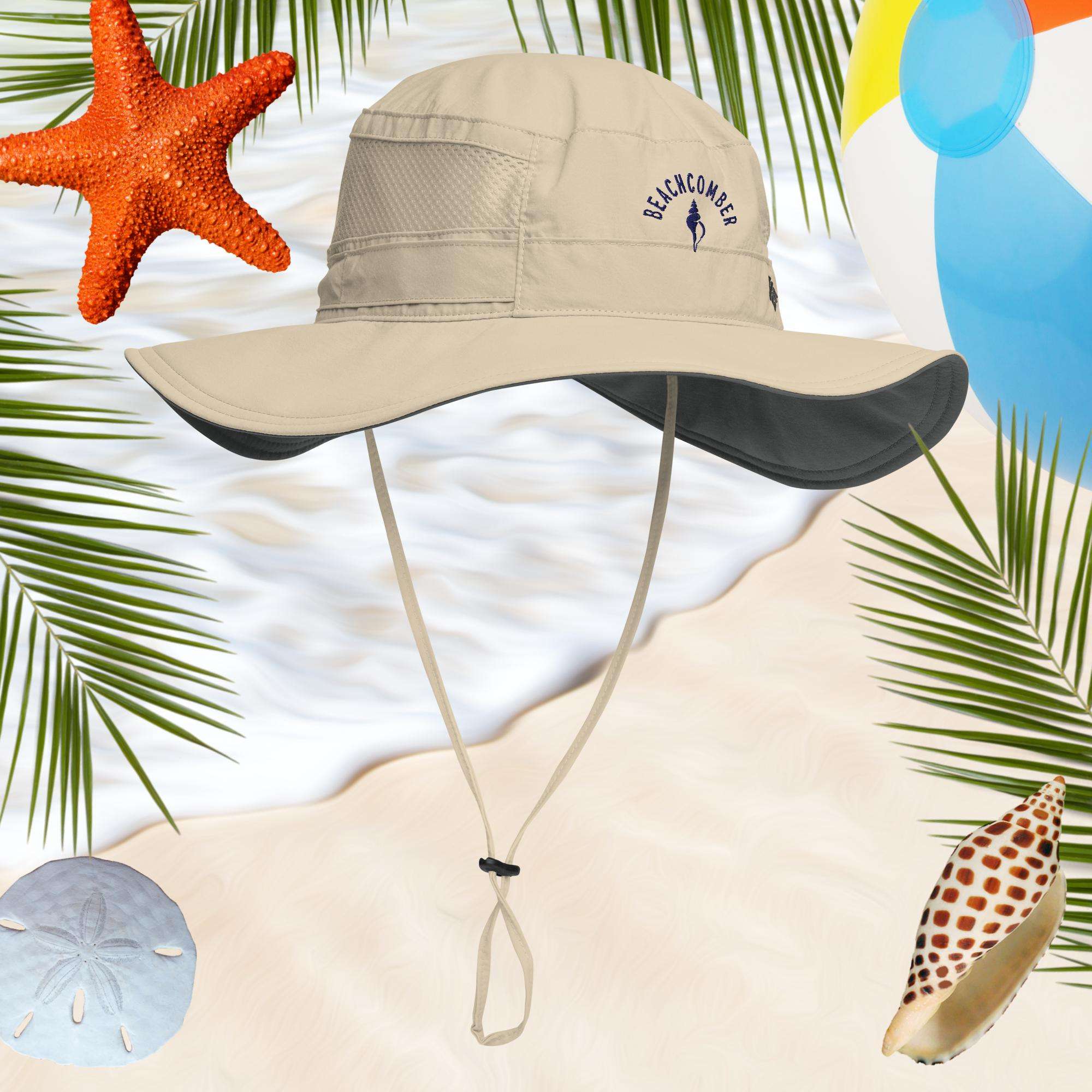 Beige bucket hat with a beachcomber logo on a beach-themed background with starfish, shells, and palm leaves.