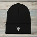 A black ribbed knit beanie hat with a folded cuff, featuring a small white embroidered shark tooth logo on the front, shown against a plain white background.
