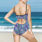 Model in Mermaid one piece cut out swimsuit facing the ocean