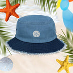 Two Toned Blue Denim Bucket Hat on the beach with a Sand Dollar, Starfish and a Beach Ball