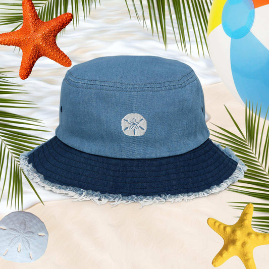 Two Toned Blue Denim Bucket Hat on the beach with a Sand Dollar, Starfish and a Beach Ball