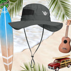 Gray sun hat with a shaka logo on a beach background with surfboard, ukulele, and car.