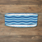 back of Blue and white striped bandeau bikini top on a nautical wood background