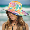 Colorful tie-dye bucket hat worn by a model on Miami Beach