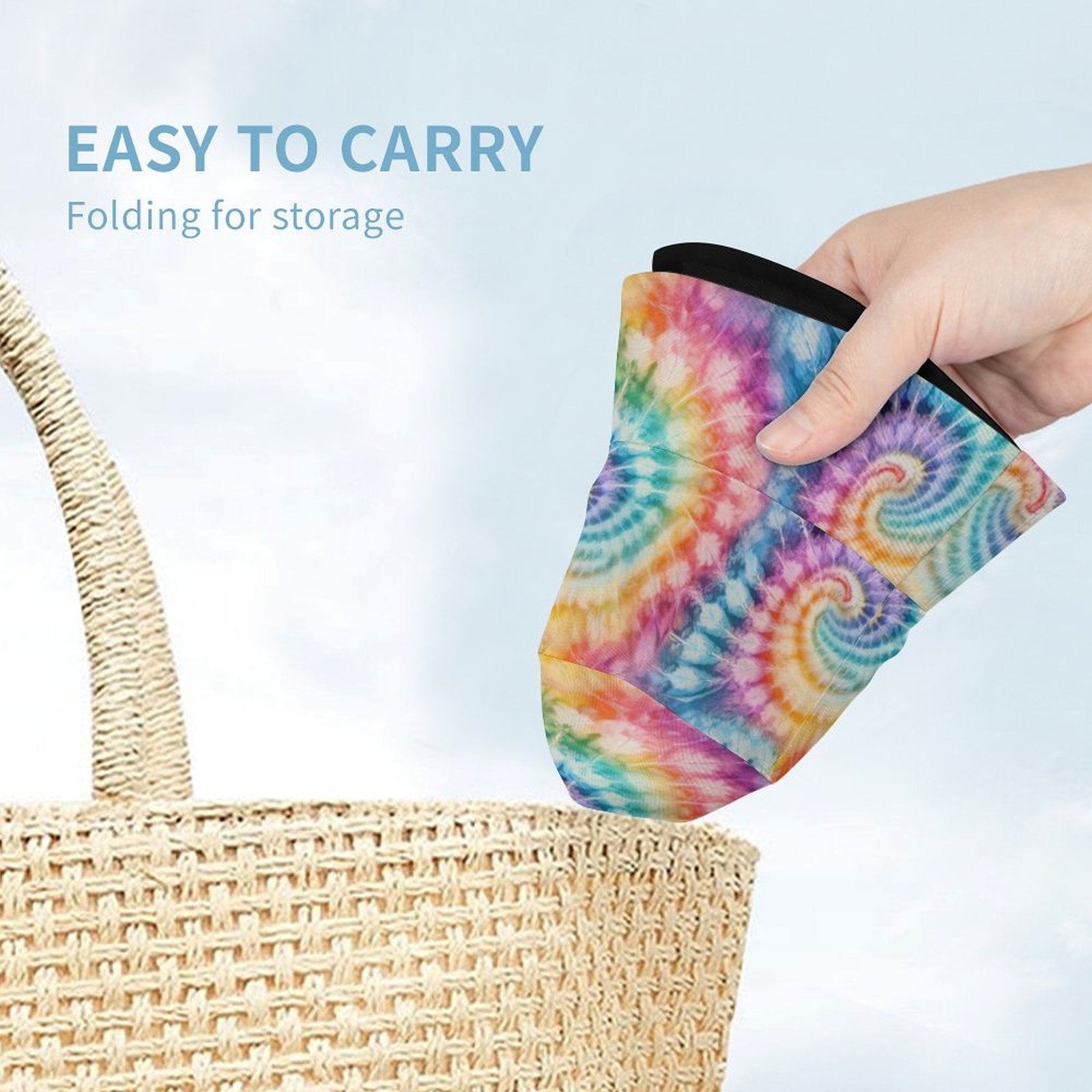 Colorful tie-dye kids' bucket hat being folded and placed into a woven bag with text 'Easy to carry' and 'Folding for storage'.