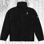 A black fleece zip-up jacket with a stand-up collar, laid flat against a white wood plank background with a faint palm leaf pattern.