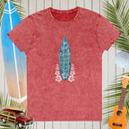 Red t-shirt with a blue surfboard graphic and text on a wooden background with beach elements.