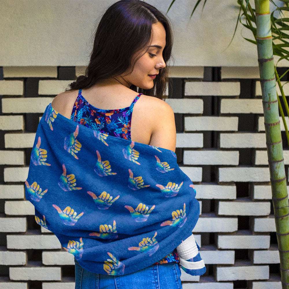 Swimwear model wrapped in a Bongo Beachwear Shaka Beach Towel